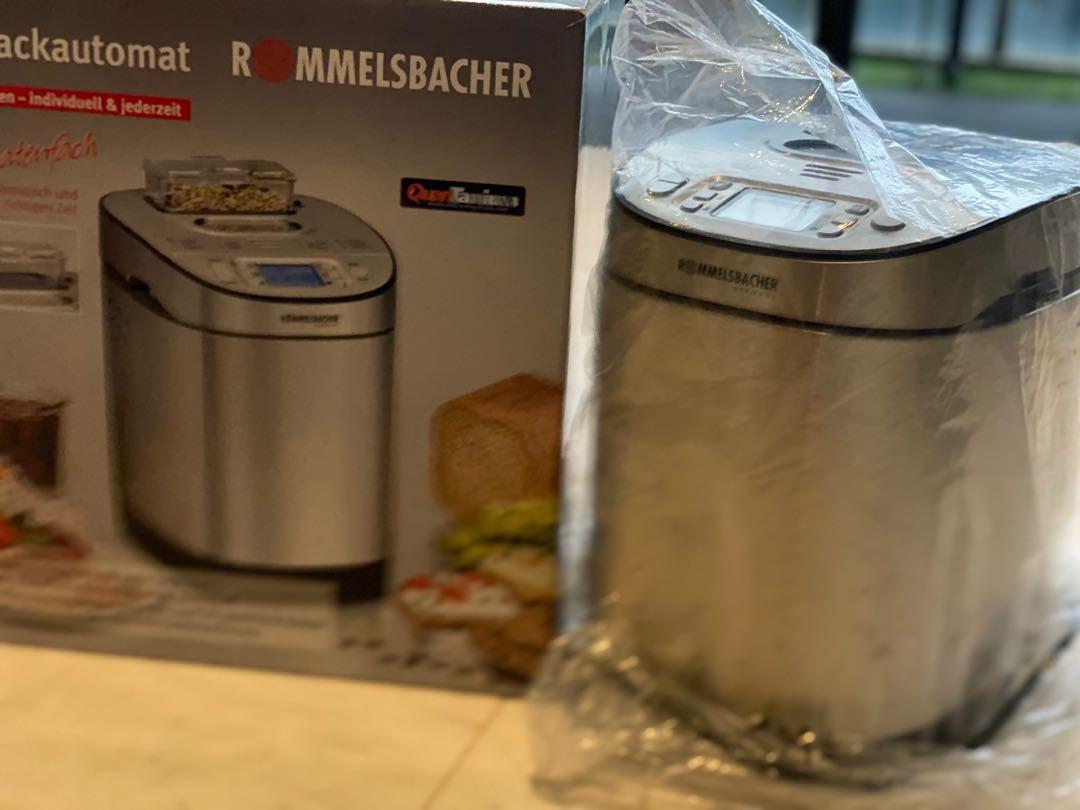 Newish Breadmaker (Category: Breadmakers) located in Singapore. Submitted by t_5ky (Listing ID 1130950883, Image 1). Description: Newish Rommelsbacher Breadmaker BA550 w/ Electric Knife EM150 Used < 5x - Reliable German Appliance - Automatic ingredients container for nuts/fruits - 2 bread size : 700 g & 900 g (Small (2) and Medium (4) size family) Product Feature - High Wattage : 550 W - Dimensions : (W) 22 X (D) 29.5 x (H) 33 cm - Stainless stee
