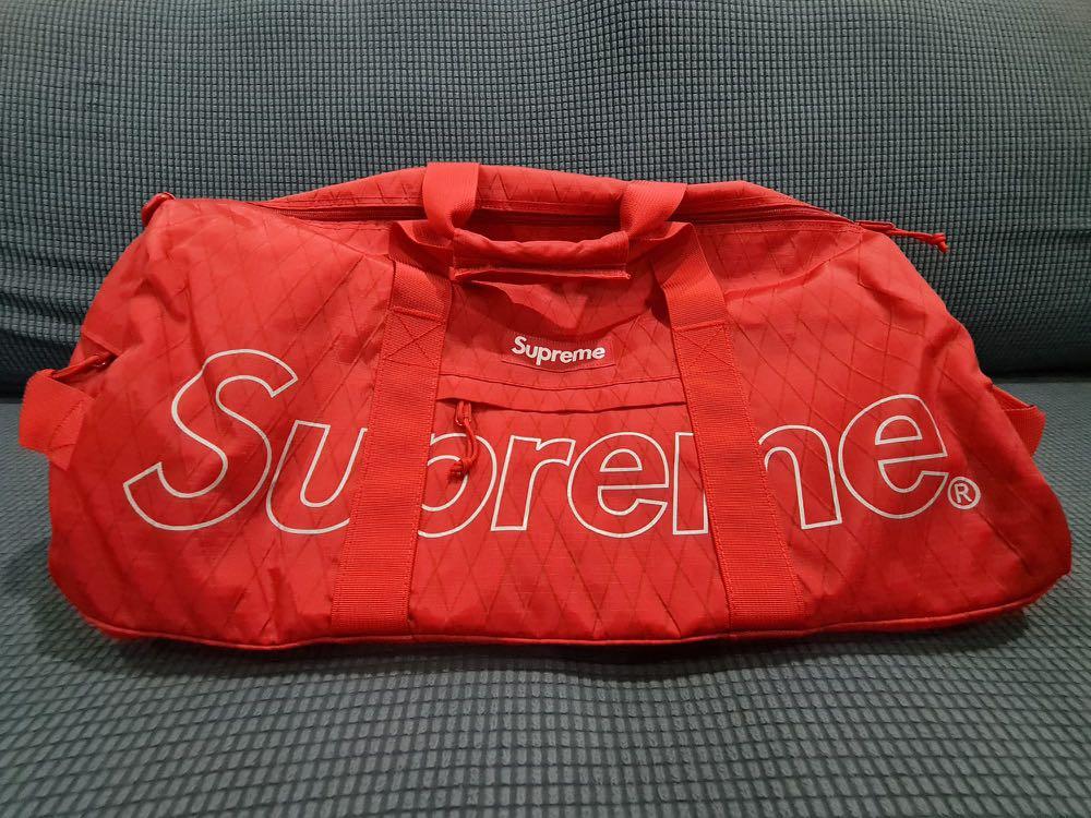 Supreme duffle in red released 2018, Men's Fashion, Bags, Sling