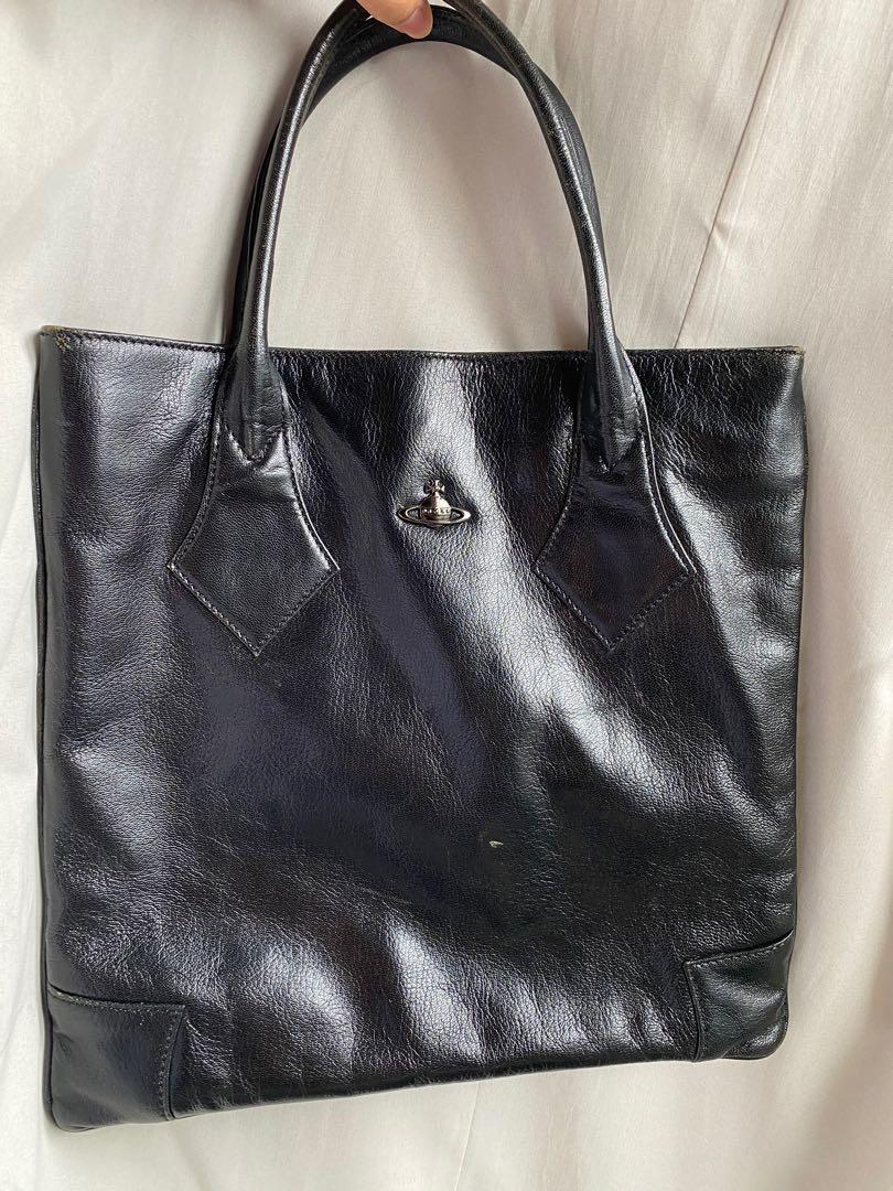 Authentic Vivienne Westwood Handbag/Mini Tote (Category: Luxury Bags & Wallets) located in Quezon City. Submitted by pineapplecakes (Listing ID 1131088330, Image 1). Description: AUTHENTIC vivienne westwood genuine leather all black handbag. bought from a well-trusted vintage store on instagram for 2,500+shipping (swipe for screenshot!) has minor signs of wear present, but those were present ever since i got it. rfs: no longer using it, declutter