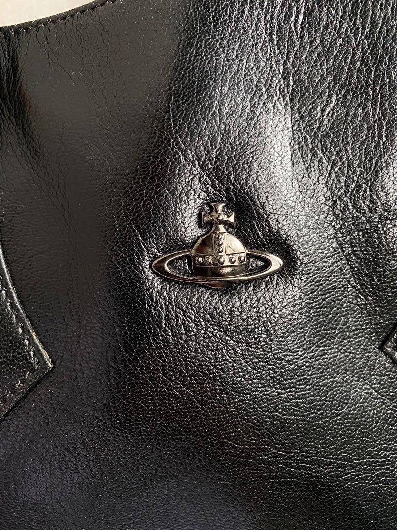 Authentic Vivienne Westwood Handbag/Mini Tote (Category: Luxury Bags & Wallets) located in Quezon City. Submitted by pineapplecakes (Listing ID 1131088330, Image 3). Description: AUTHENTIC vivienne westwood genuine leather all black handbag. bought from a well-trusted vintage store on instagram for 2,500+shipping (swipe for screenshot!) has minor signs of wear present, but those were present ever since i got it. rfs: no longer using it, declutter