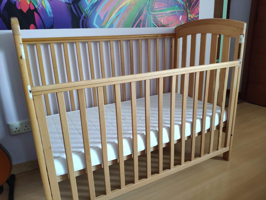Cot with removable side hot sale