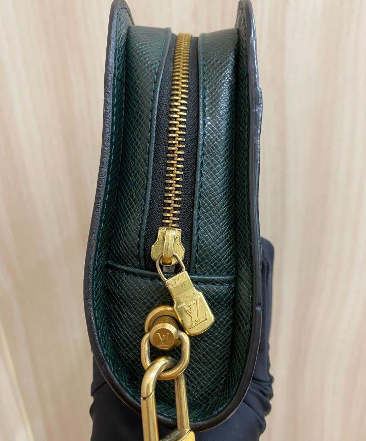 L V Epicea Taiga Leather Pochette Baikal Clutch, Luxury, Bags & Wallets on  Carousell