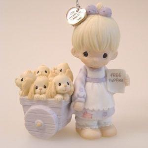 Precious moments free puppies value clearance