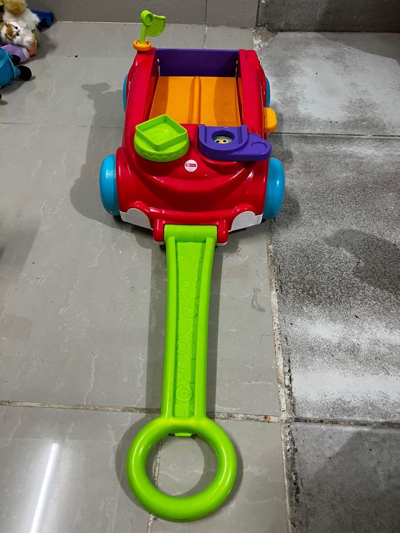 Fisher price roller on sale blocks rockin wagon