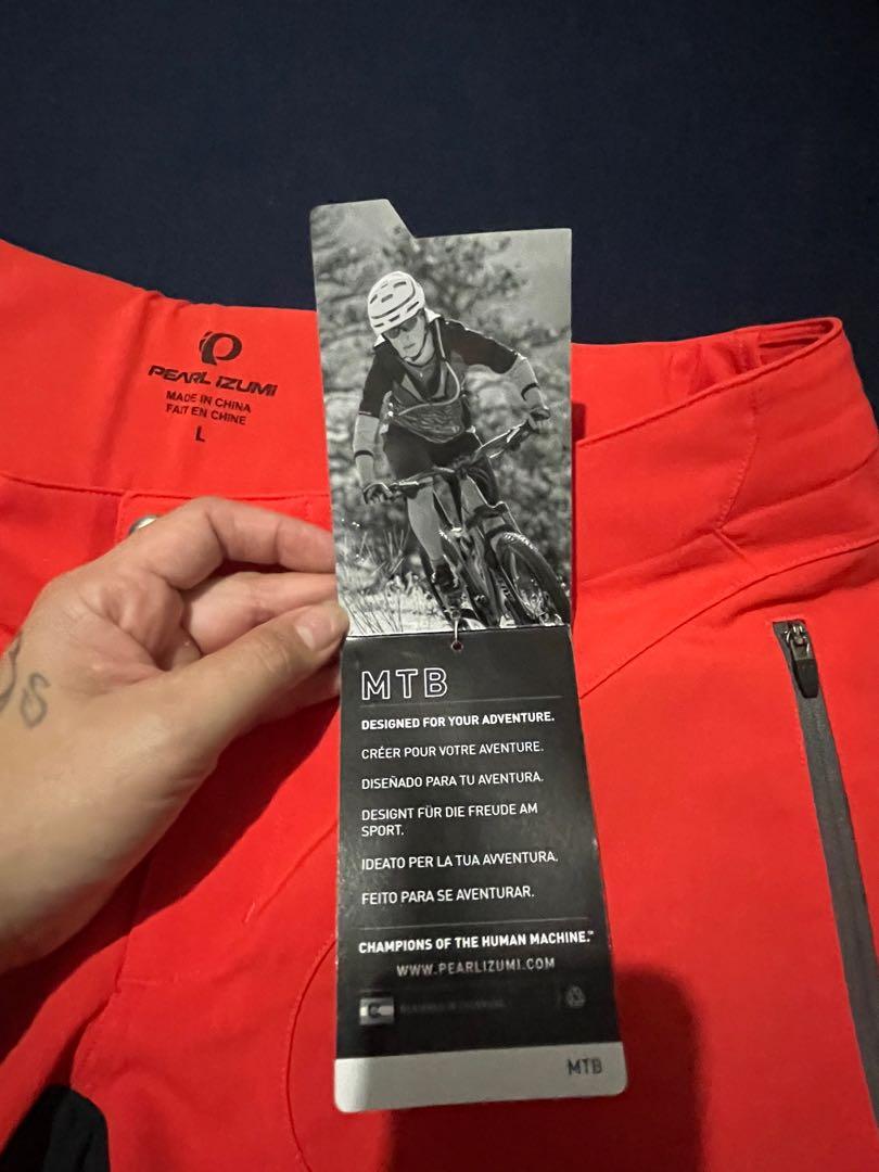 Pearl Izumi MTB shorts (Category: Activewear) located in Imus. Submitted by pguecs (Listing ID 1131371902, Image 3). Description: Brand new and 100% AUTHENTIC Pearl Izumi Elevate MTB shorts in Poppy Red color. Size L (fits large to XL frames). This is women’s shorts but can also be worn by men with M-L build. Bought this from the US, still with tag. Perfect for MTB users and trail riding. RFS: wrong size. I have another one in my size already. Or