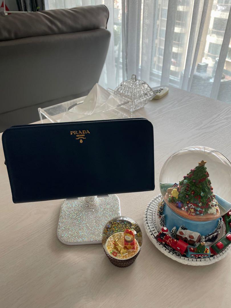 Prada (Category: Wallets & Card Holders) located in Singapore. Submitted by summer1308 (Listing ID 1131292952, Image 3). Description: Prada saffiano zip around wallet. Good for travel. Happy to meet if you want to authenticate the item..
