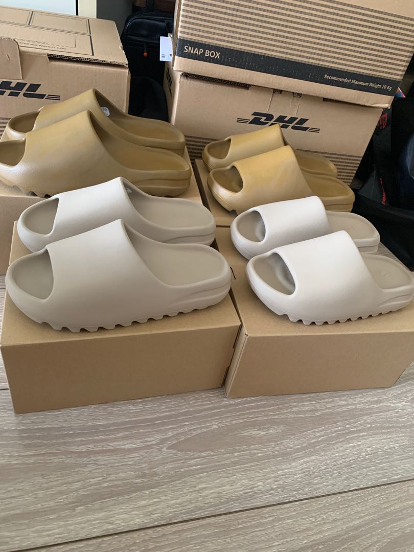 YEEZY SLIDE PURE AND THE YEEZY SLIDE OCHRE