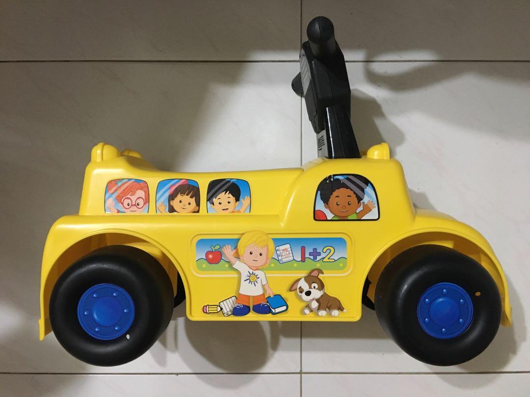 Fisher price store ride on bus