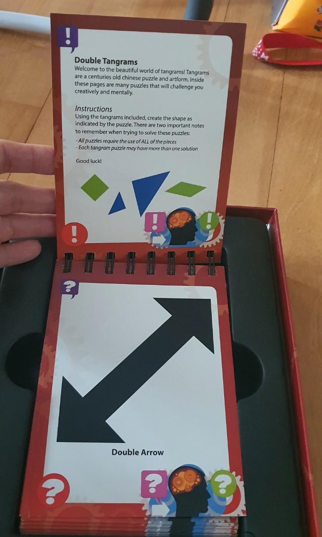 Double tangrams (Category: Board Games & Puzzles) located in Singapore. Submitted by 456465 (Listing ID 1131600530, Image 6). Description: my son doesn't interest on it. condition good..