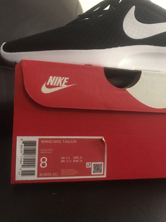 nike tanjun size 14