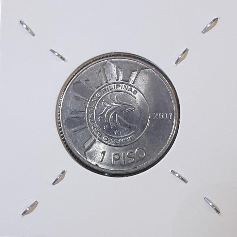 150 YEARS COMMEMMORATIVE ONE PESO COIN (Category: Currency) located in Quezon City. Submitted by ELDORADO63 (Listing ID 1131739398, Image 2). Description: 150 YEARS COMMEMMORATIVE ONE PESO COIN Plus Shipping Fee.