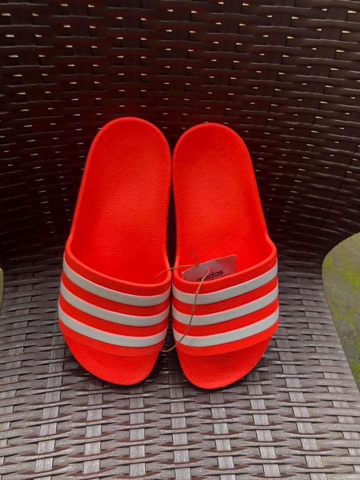 Adidas neon orange slides store