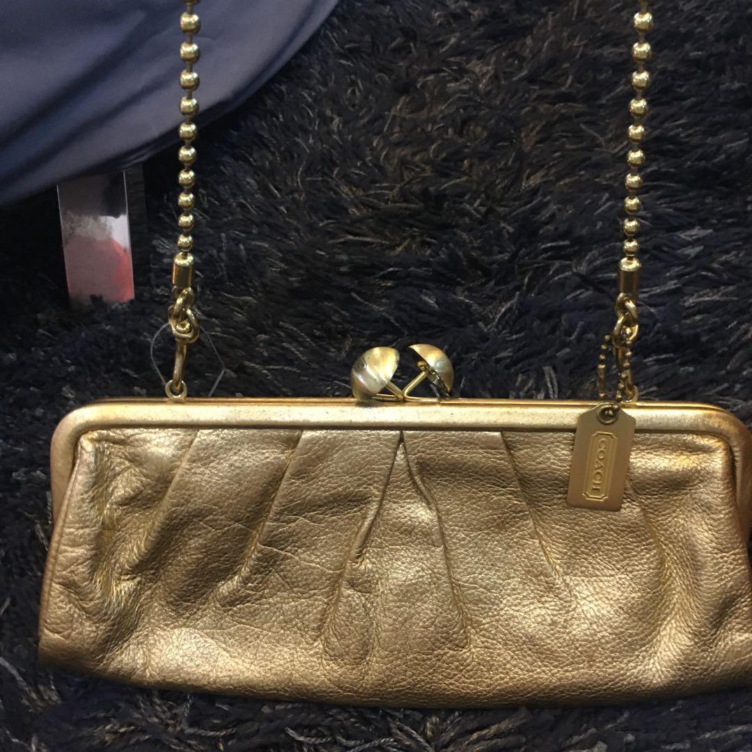 Coach gold clutch hotsell