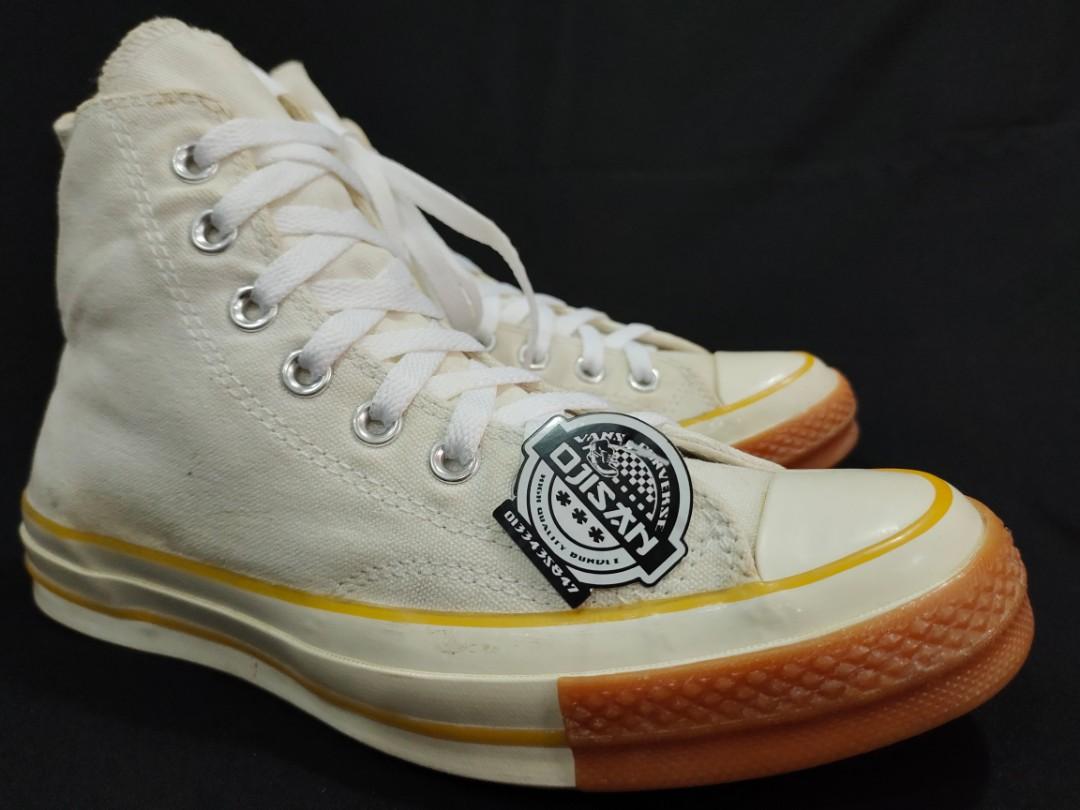 White converse with clearance orange tag