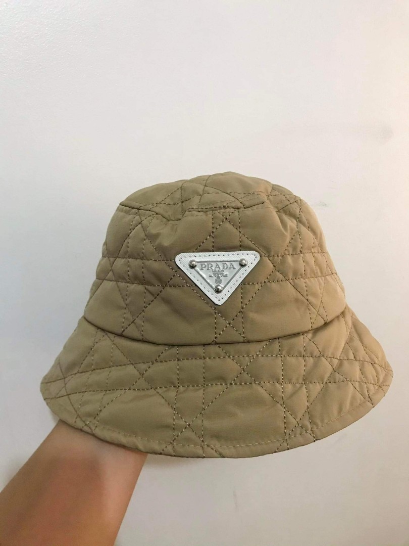 nude prada bucket hat