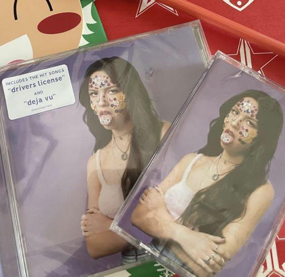 SOUR cassette and CD bundle (Category: CDs & DVDs) located in Manila. Submitted by stefandraboutique (Listing ID 1131651478, Image 1). Description: SOUR Fan Bundle: SOUR CD & Cassette available for 1799 php only. One slot of each bundle only. First come, first serve basis. Will be given with a Christmas lootbag as well. 💚.