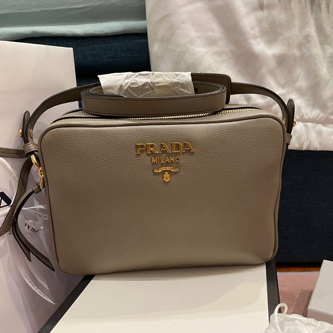 PRADA Vitello Phenix Double Zip Crossbody camera leather bag, Women's  Fashion, Bags & Wallets, Cross-body Bags on Carousell