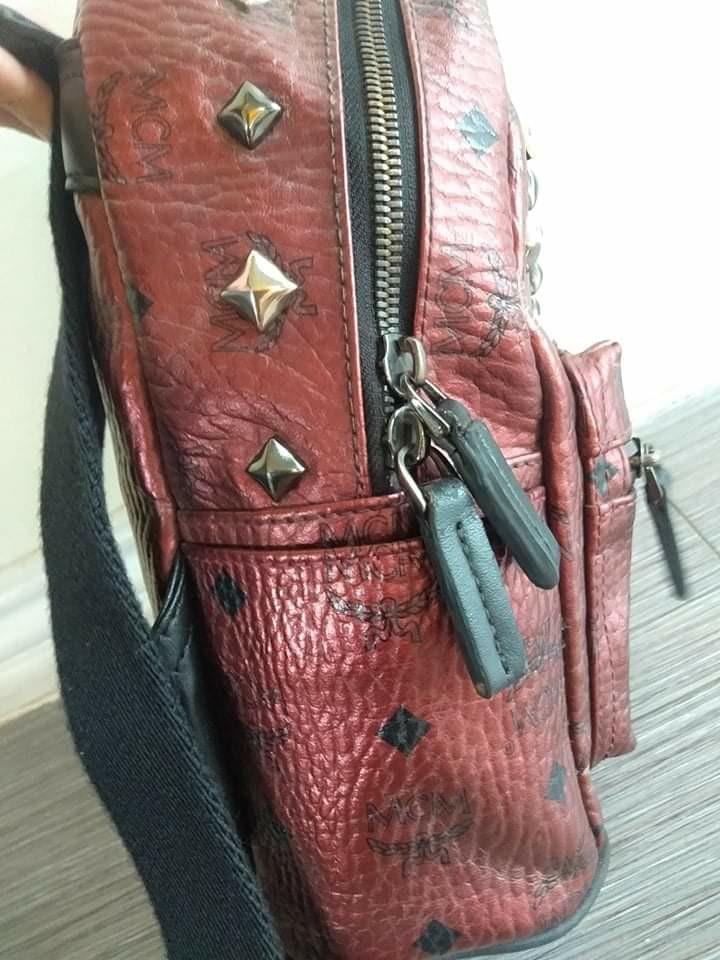 Authentic MCM Backpack ( Look at the receipt and if its fake i will hold  full legal resonsibilty ), Luxury, Bags & Wallets on Carousell