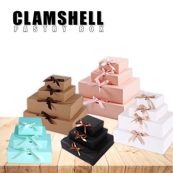 Clamshell Pastry Box packaging (Category: Storage Boxes & Baskets) located in Malabon City. Submitted by heyitskhen (Listing ID 1118015393, Image 1). Description: White, Brown, Black (black ribbon), Pink and Mint green Small 11x11x5cm -25 each Medium 17x-17x5cm-26 each Medium 1-24x24x6cm-33 each Large 27x20x8cm- 36 each XL- 31x26x8cm-45 each MoP: GCASH ONLY LOCATION: MALABON CITY FOR ORDERS 5pcs below additional 15 pesos for transaction fee. .