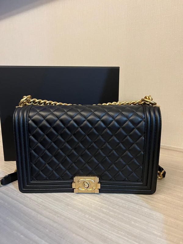 Large boy chanel handbag price on sale