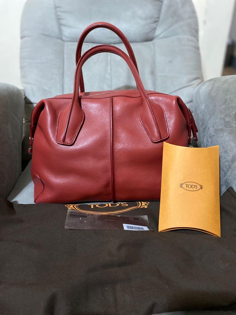 Tod's D-Styling Bauletto Piccolo Bag (Category: Luxury Bags & Wallets) located in Muntinlupa City. Submitted by momofsix925 (Listing ID 1132165693, Image 1). Description: Tod's D-Styling Bauletto Piccolo Bag Used Once 100% Authentic With dustbag cards Unused Strap .