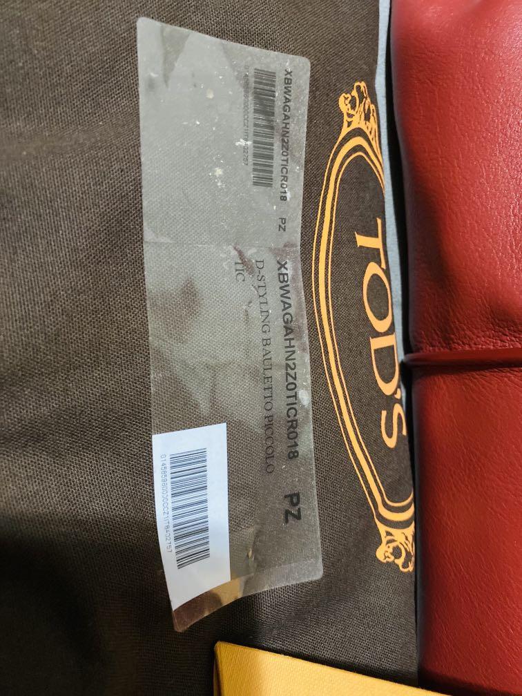 Tod's D-Styling Bauletto Piccolo Bag (Category: Luxury Bags & Wallets) located in Muntinlupa City. Submitted by momofsix925 (Listing ID 1132165693, Image 3). Description: Tod's D-Styling Bauletto Piccolo Bag Used Once 100% Authentic With dustbag cards Unused Strap .