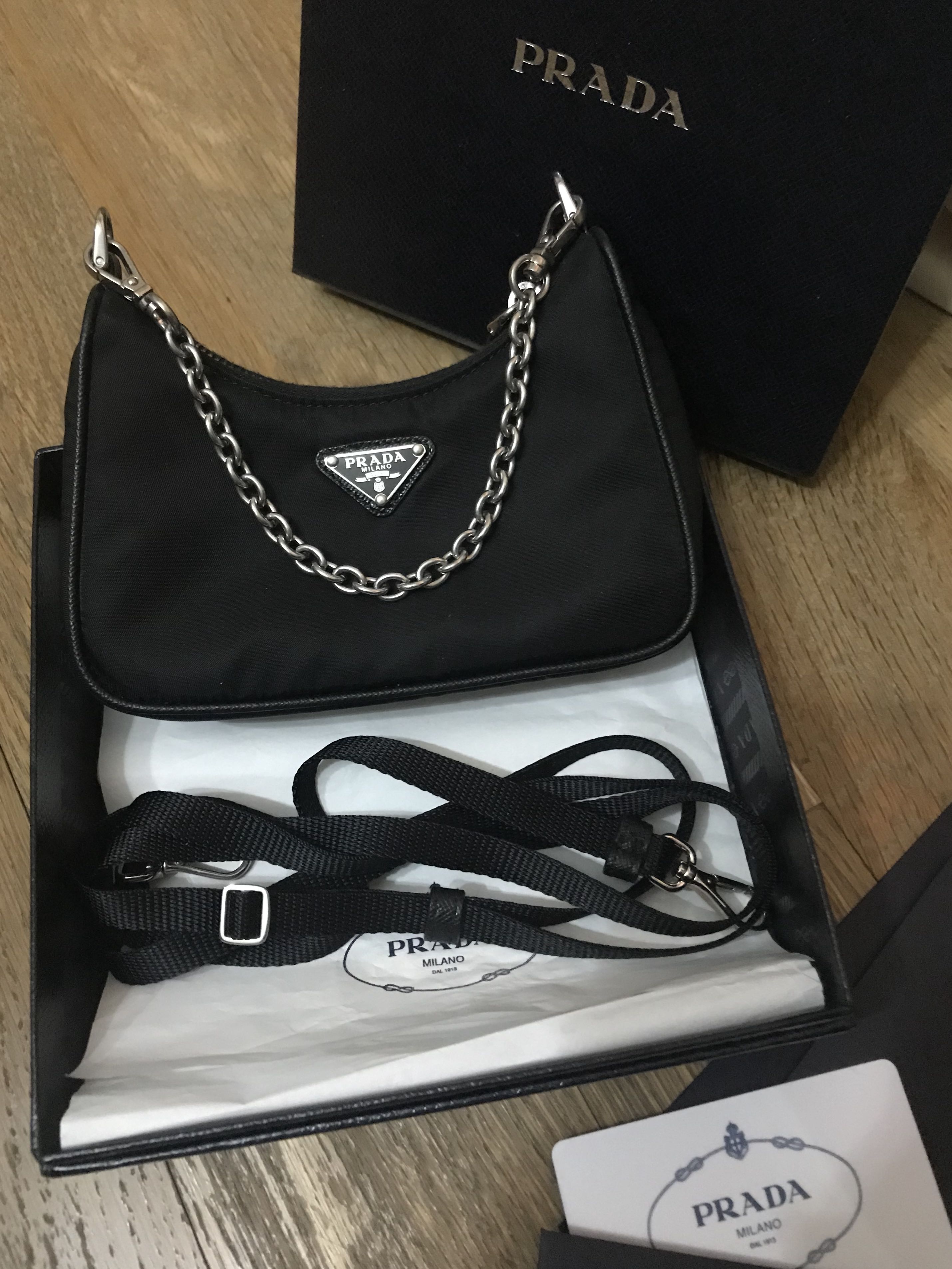 Prada re hotsell edition chain bag