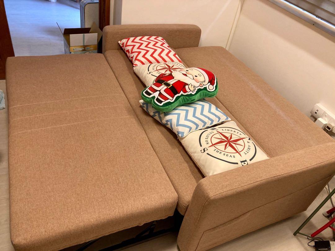 Sofa Bed (Category: Sofas) located in Singapore. Submitted by chd88 (Listing ID 1132301007, Image 3). Description: Material: Fabric Color: Brown Sofa: 2-seater Bed: 1.9m length x 1.5m width when open up as a bed Has wheels to allow one to move furniture around the house Condition: good as rarely used.