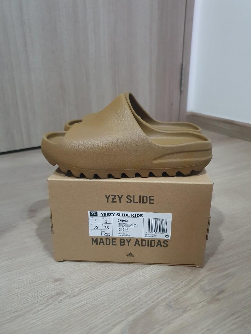 KIDS 3k Yeezy Slides Ochre, Men's Fashion, Footwear, Flipflops and Slides  on Carousell