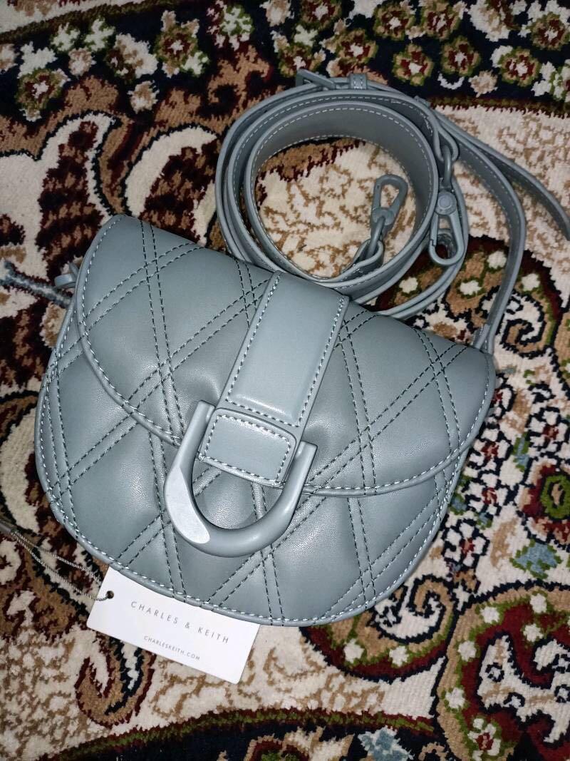 Quilted shop saddle bag