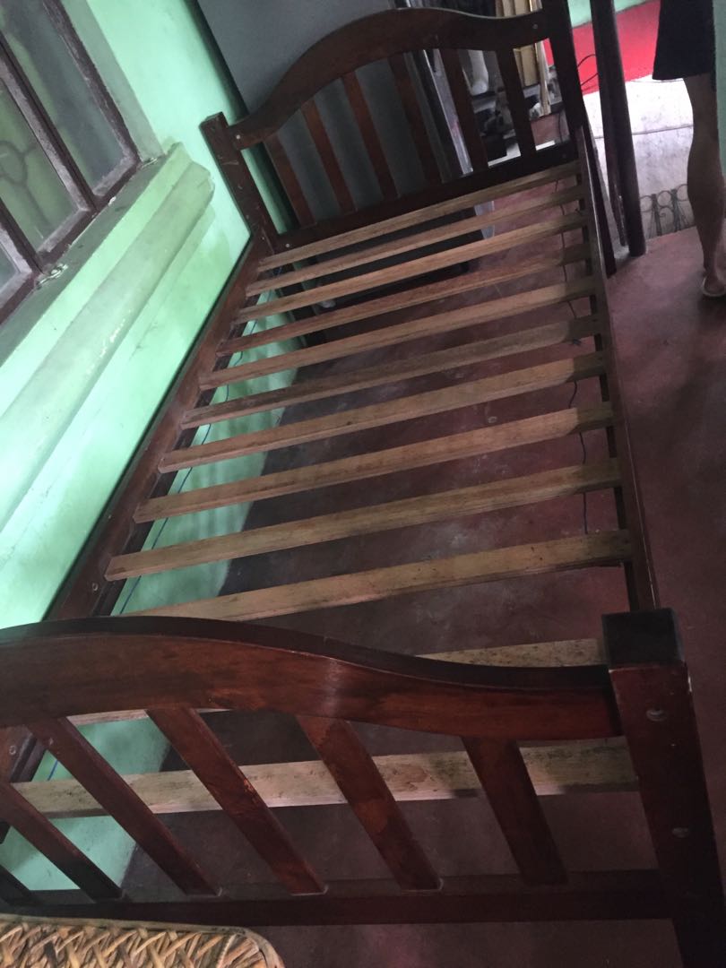 Second hand single bed frame 36 by 75 malaysian wood detachable