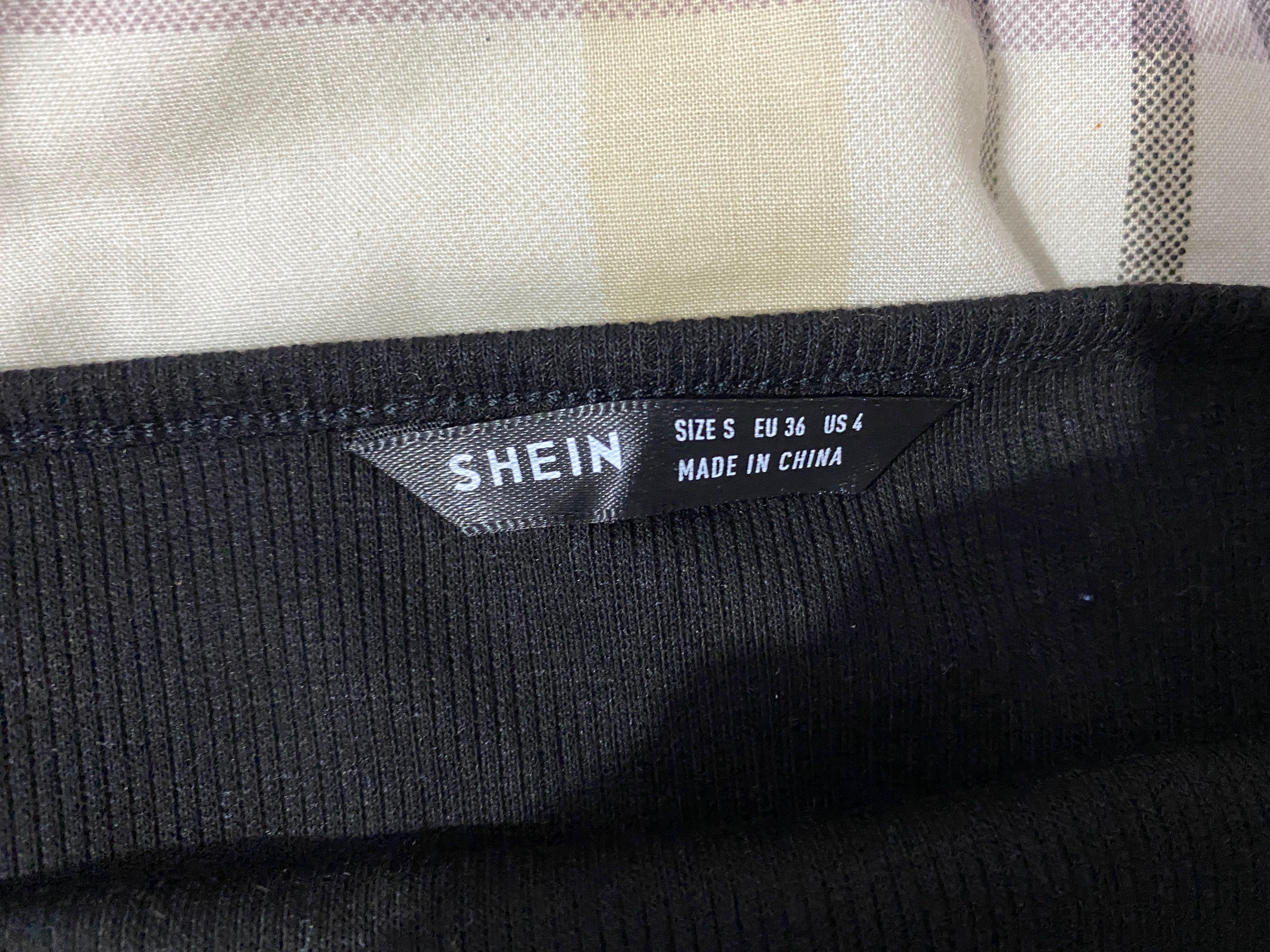 Shein Backless Halter Top (Category: Sleeveless) located in Las Pinas. Submitted by chicky_nini (Listing ID 1132511495, Image 2). Description: S on tag but fits M Never worn RFS: doesn't fit.