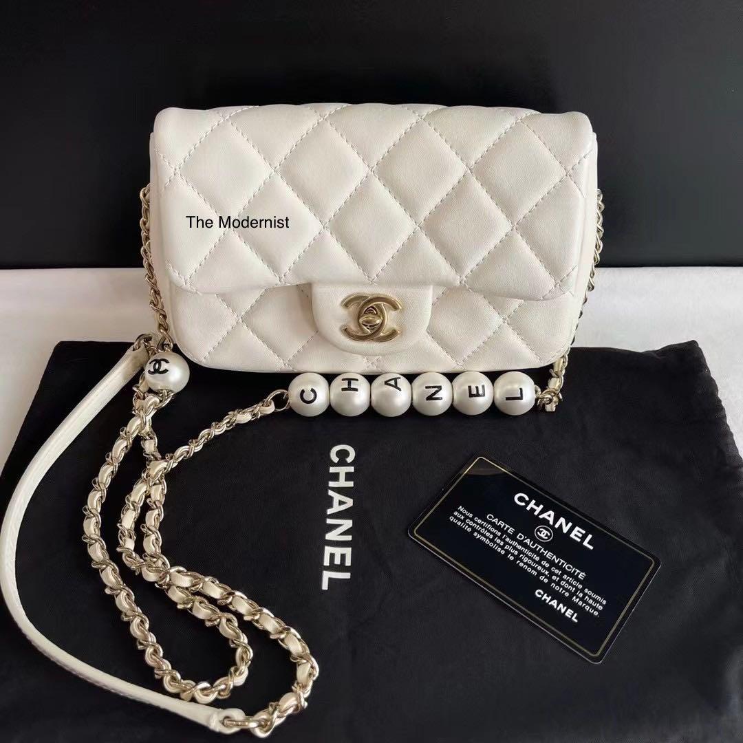 Authentic Chanel White Lambskin Logo Pearl Flap Bag Light Gold Hardware