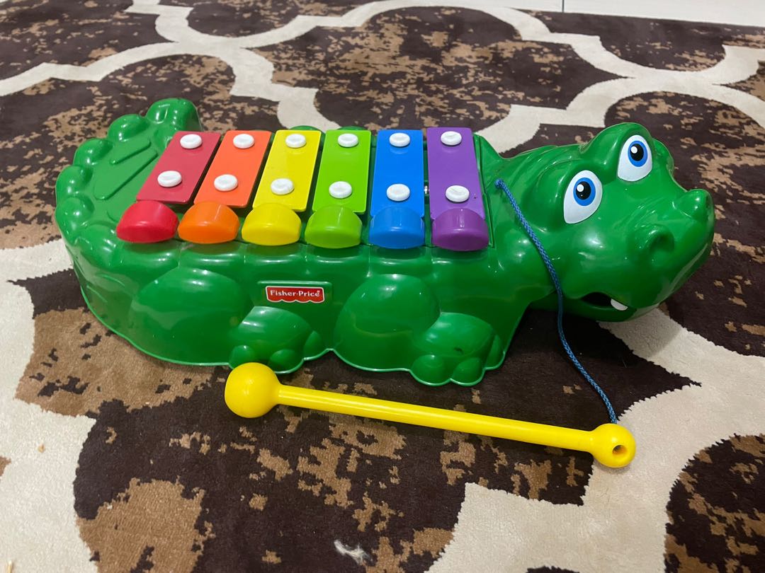 Fisher price cheap crocodile toy