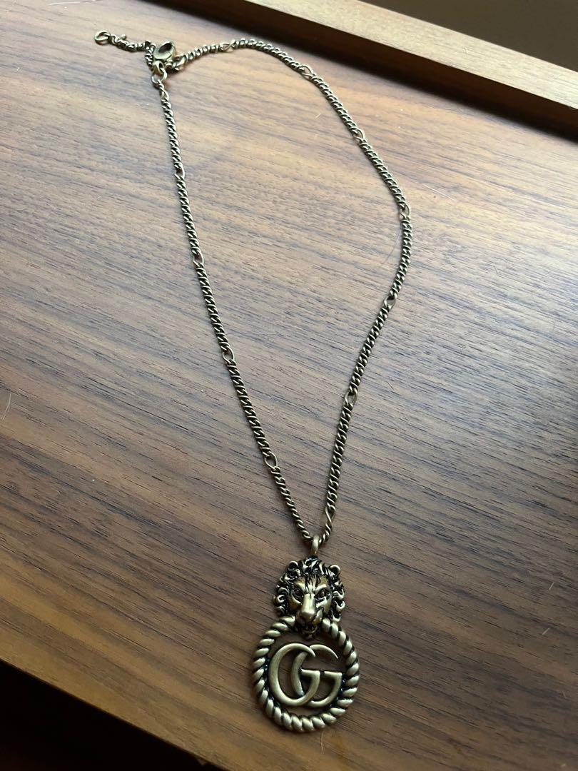 Gucci gold lion necklace hotsell