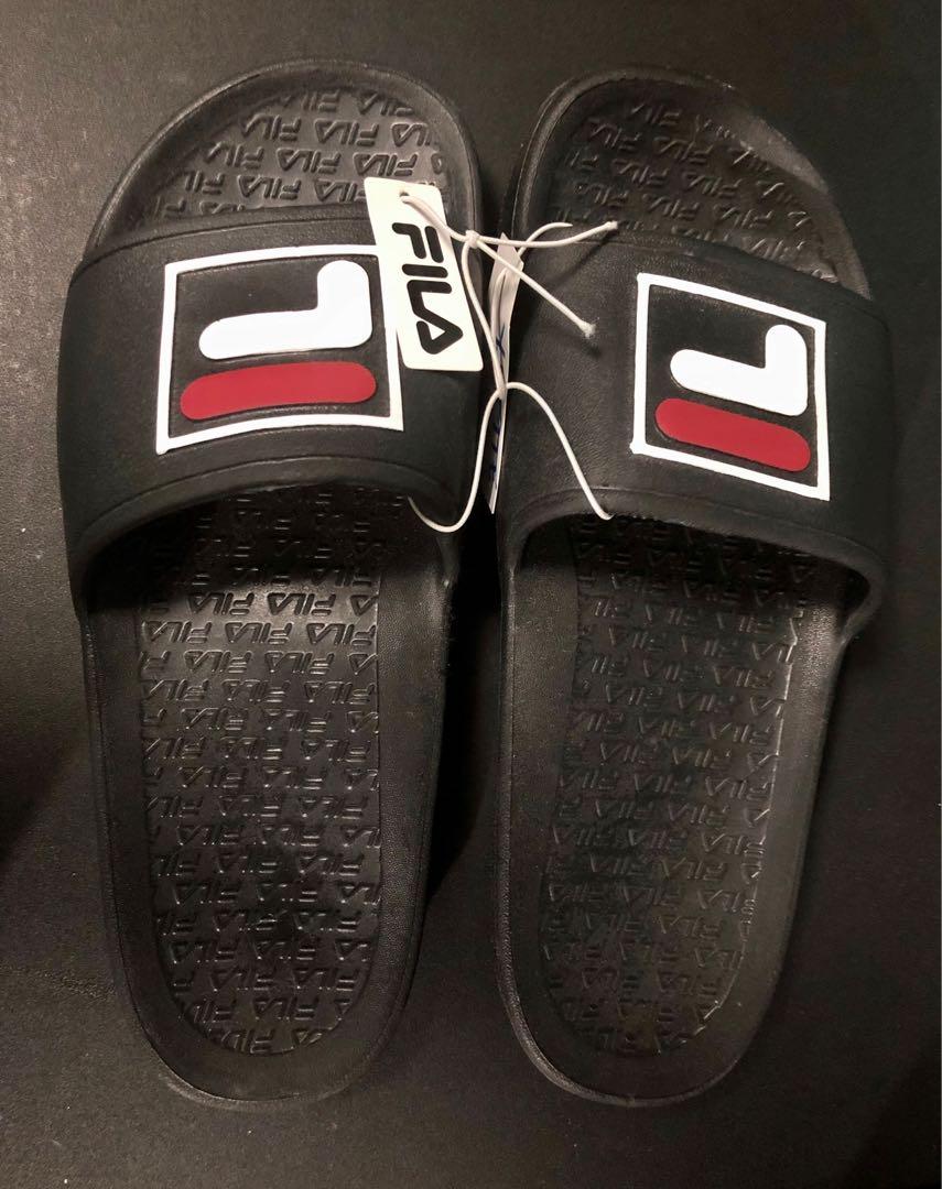 Original FILA Slides (Category: Slippers & Slides) located in Manila. Submitted by ya1121 (Listing ID 1129163146, Image 3). Description: BrandNew with Tags. Unisex. Size 9. please see photos for the exact measurements. Thank You.