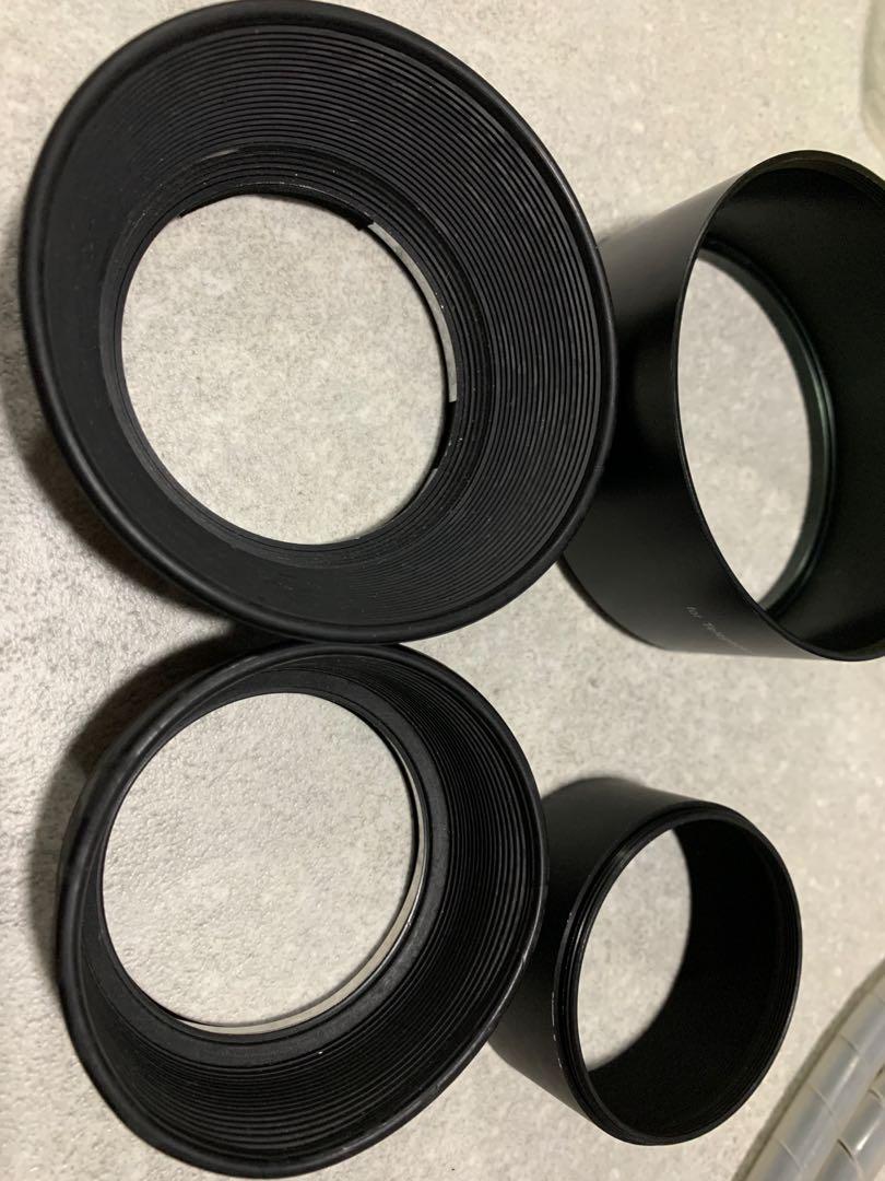 Rare original Olympus OM lens hood for three focal lengths. Four hoods