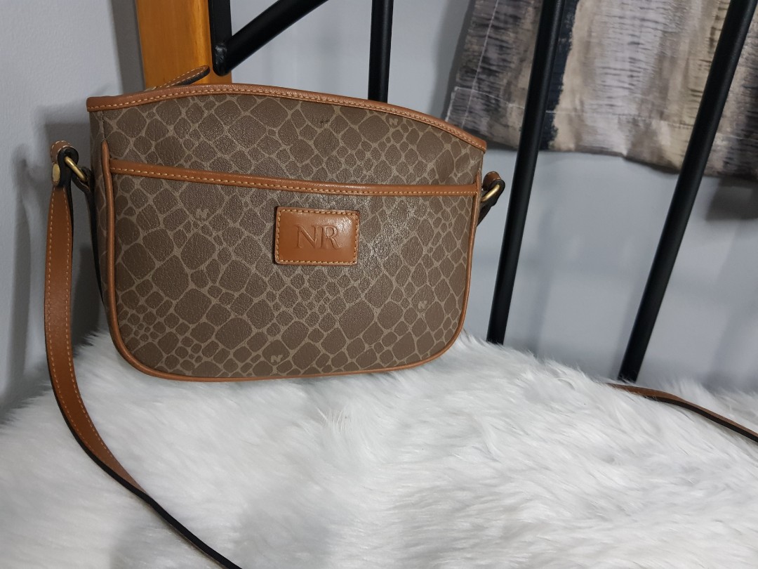 Nina ricci sling 2025 bag price