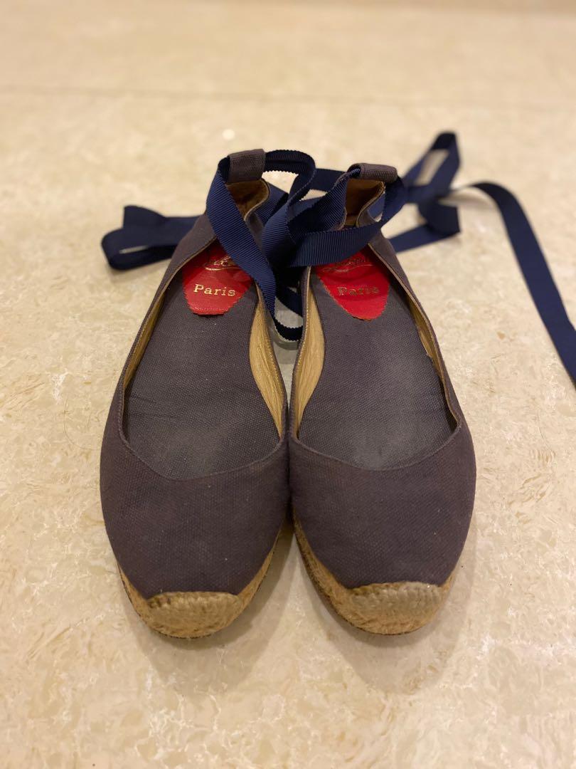 Christian Louboutin Espadrilles (Category: Sneakers & Footwear) located in Makati City. Submitted by love2give.ph (Listing ID 1132557883, Image 2). Description: Size 36 Blue canvas with round toes, tonal stitching, jute covered heels and grosgrain wrap-around closure at ankles..