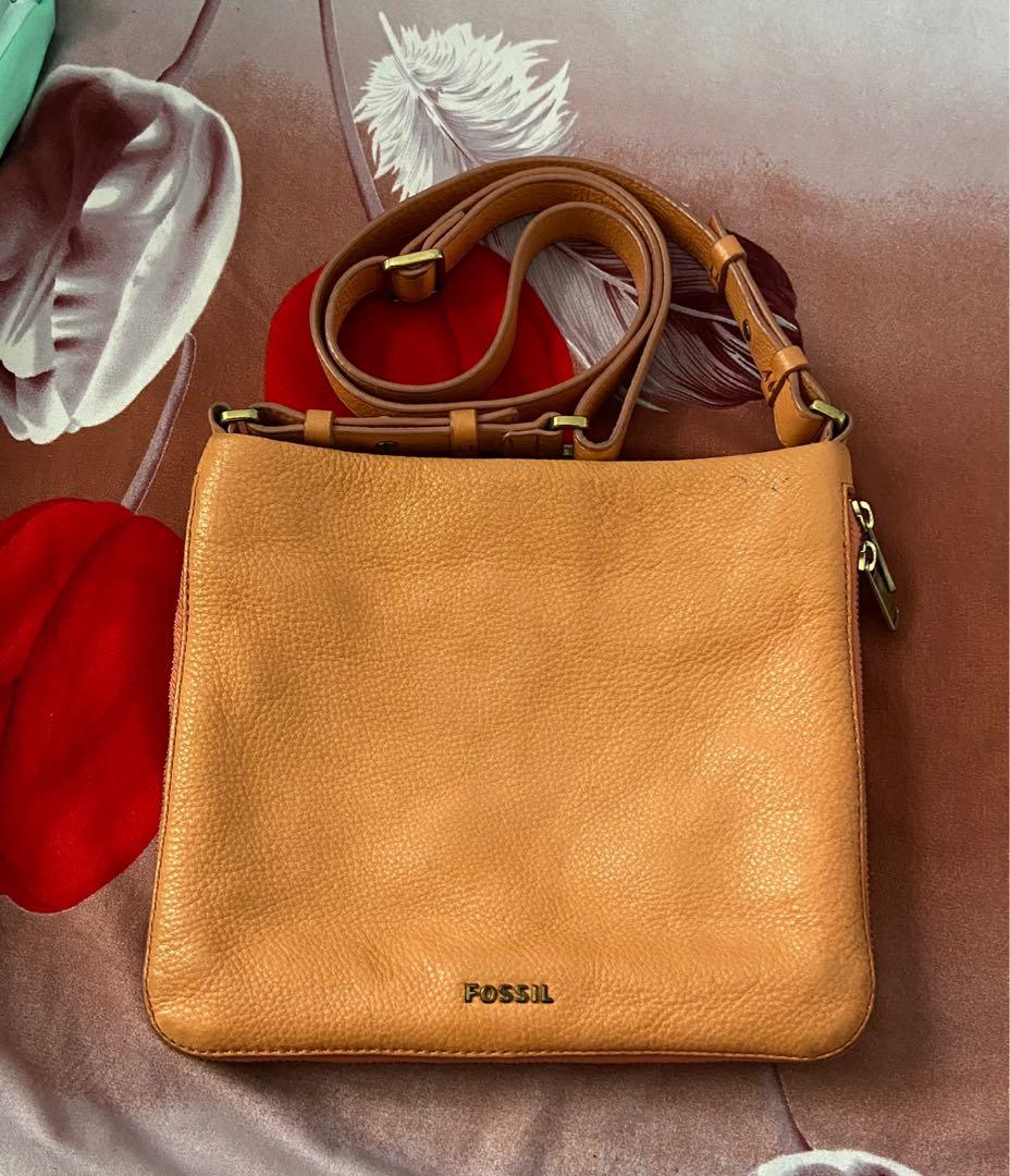 Fossil Preston Crossbody Bag (Category: Cross-body Bags) located in Concepcion. Submitted by shopdecluttereditems (Listing ID 1132574526, Image 1). Description: Fossil Preston Crossbody Bag 💯 Genuine Leather (soft) Melon color With signs of usage, faded hardware & scuffs on edges(see pics) Bought from Fossil Marquee Mall for 4k Dimensions: 9.5"L x 2.75"W x 8.25" Bag only, no other inclusions Mode of payment: Gcash, BDO or Security Bank Shipping: