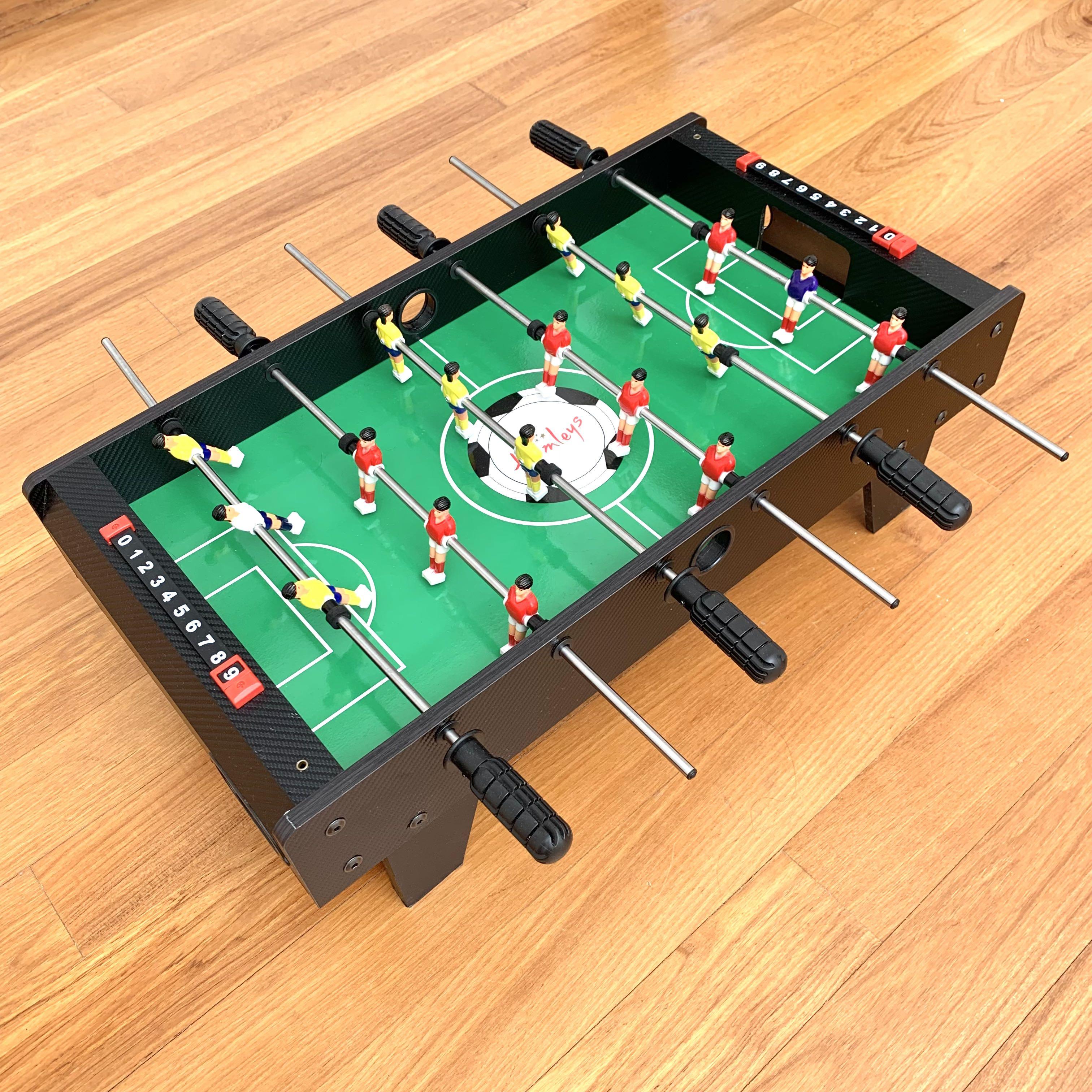 Can nego. Hamley s foosball game. Fast action soccer game