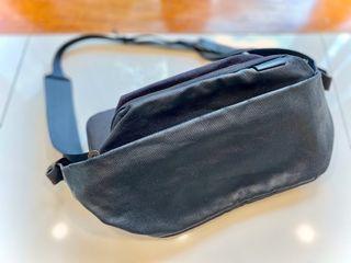 côte&ciel Isarau Coated Canvas Sling Bag