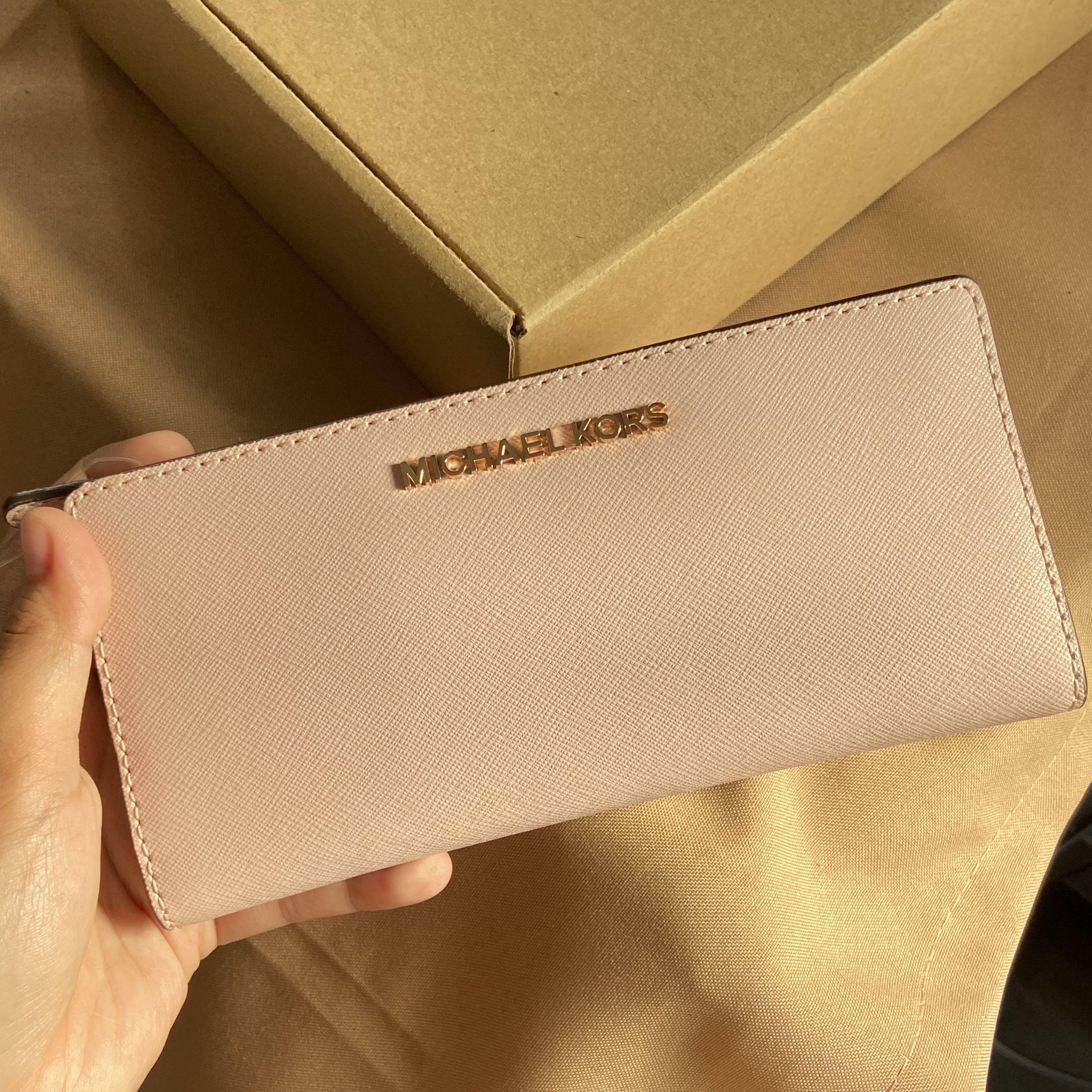 Michael Kors Red Long Wallet, Women's Fashion, Bags & Wallets, Wallets &  Card holders on Carousell