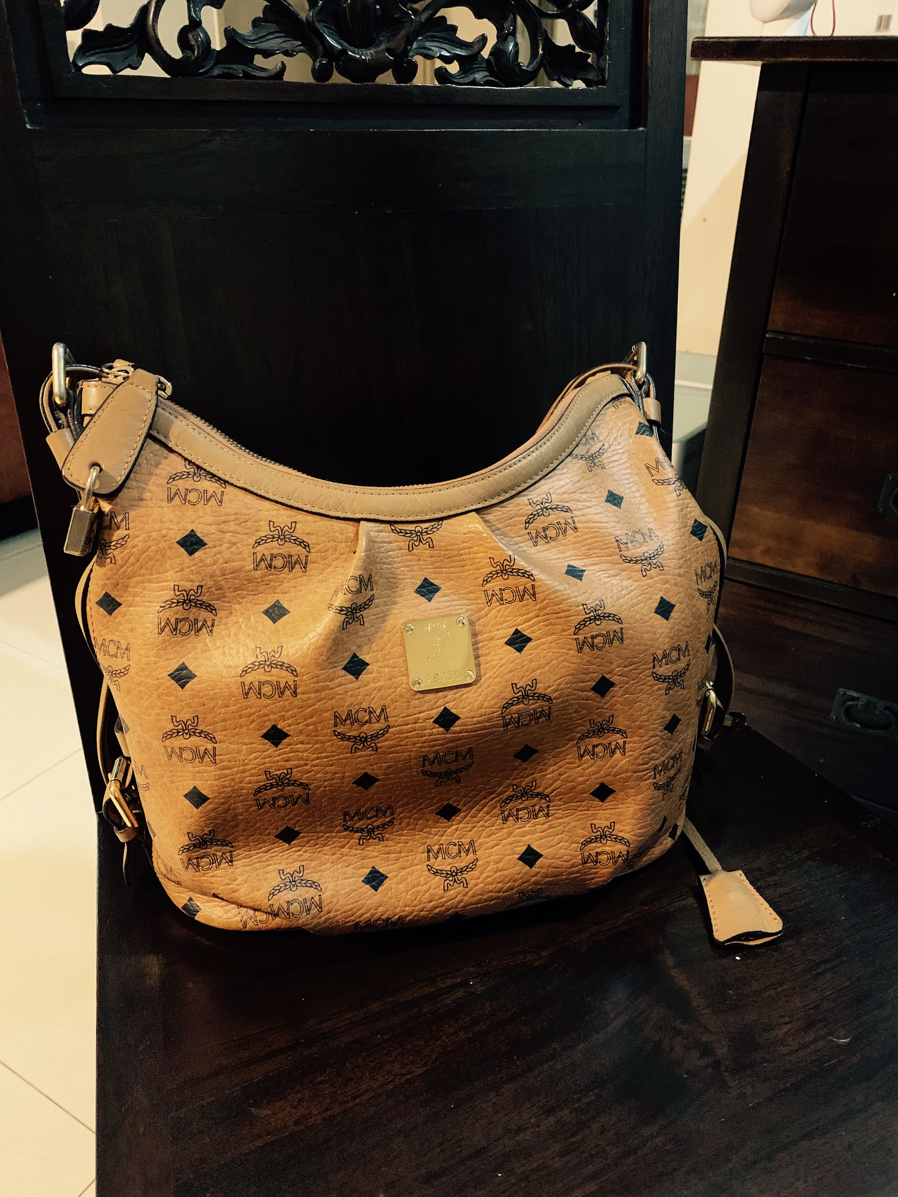 Mcm pocketbook sale top