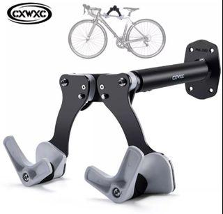 Wall mount bicycle hanger