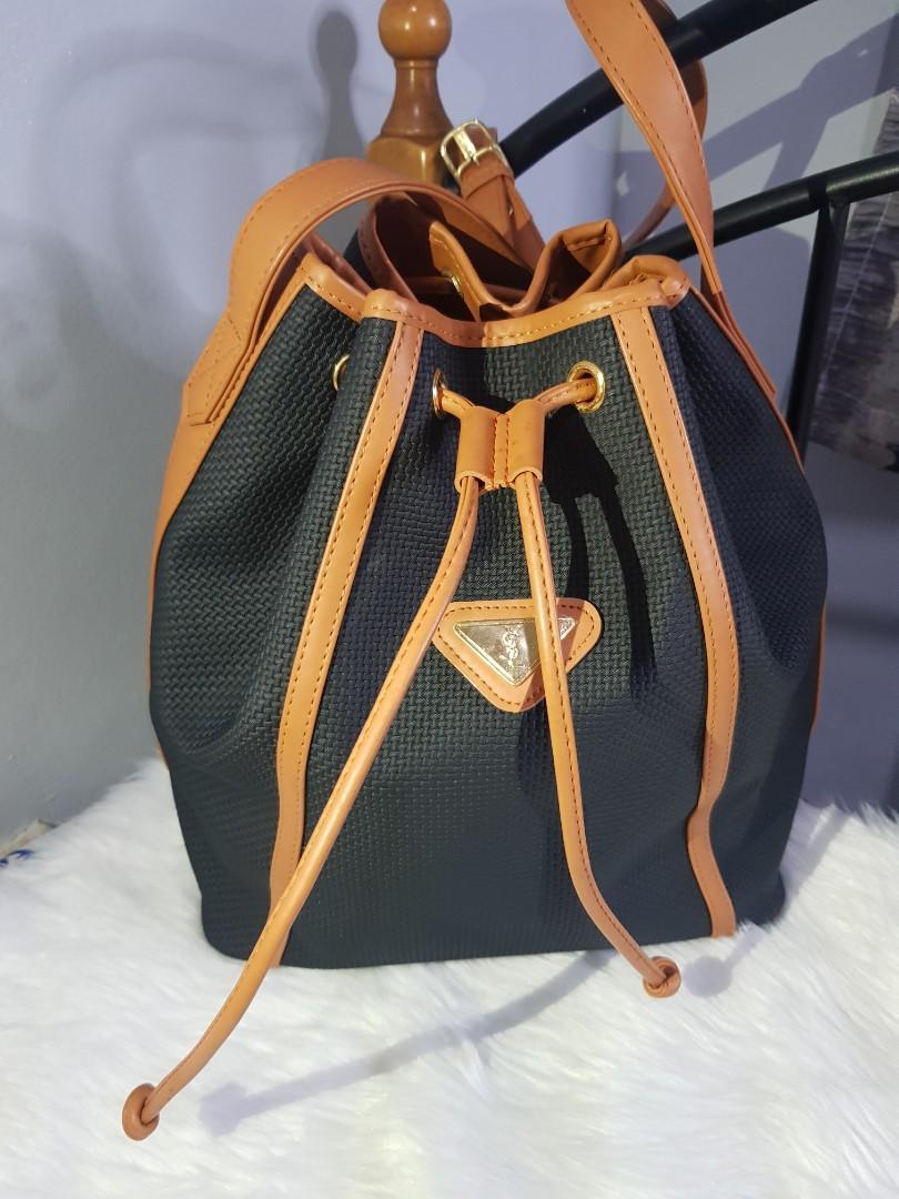 Authentic Yve Saint Laurent YSL Drawstring PVC (Category: Luxury Bags & Wallets) located in Paranaque City. Submitted by rizasauthenticitems (Listing ID 1133070500, Image 3). Description: Authentic Yve Saint Laurent YSL Drawstring PVC Condition: almost new Color: Black Height: 11.5 Length: 14.25 Material: PVC Width: 5.75.