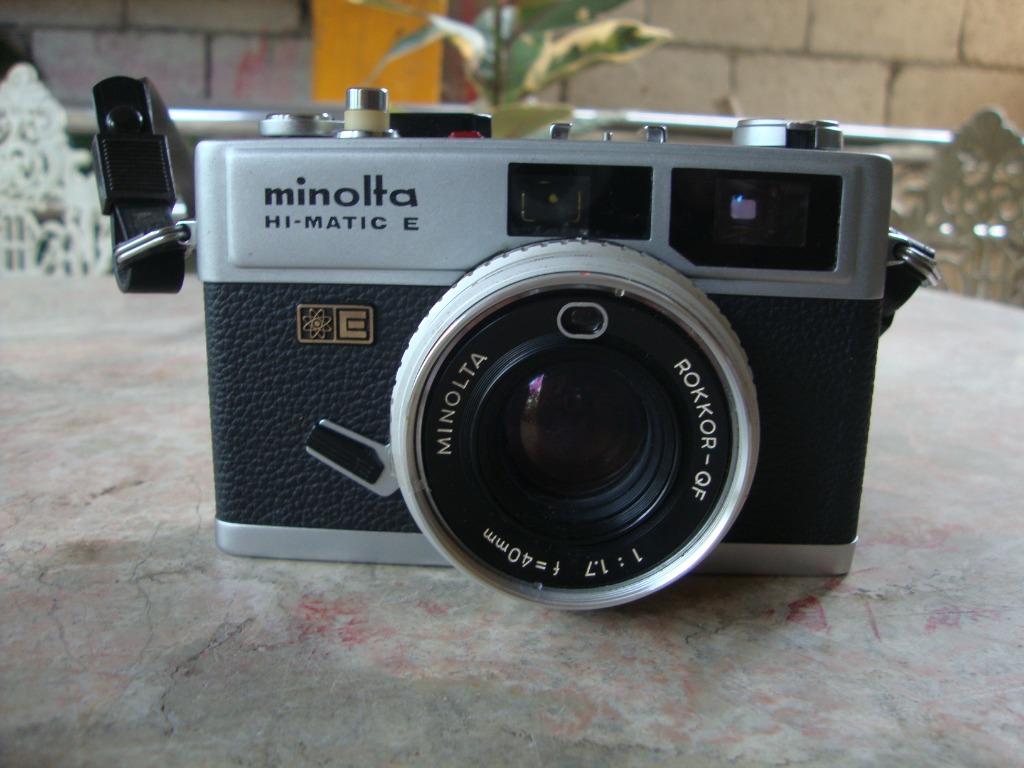 Minolta Hi-Matic E (Category: Cameras) located in Manila. Submitted by parokya_ni_edgar (Listing ID 1133014176, Image 1). Description: ( Unit are AS IS Condition, Needs to repair, For Parts or Display, Collectible Purposes Only) Japan Made 35mm - Bag - strap.