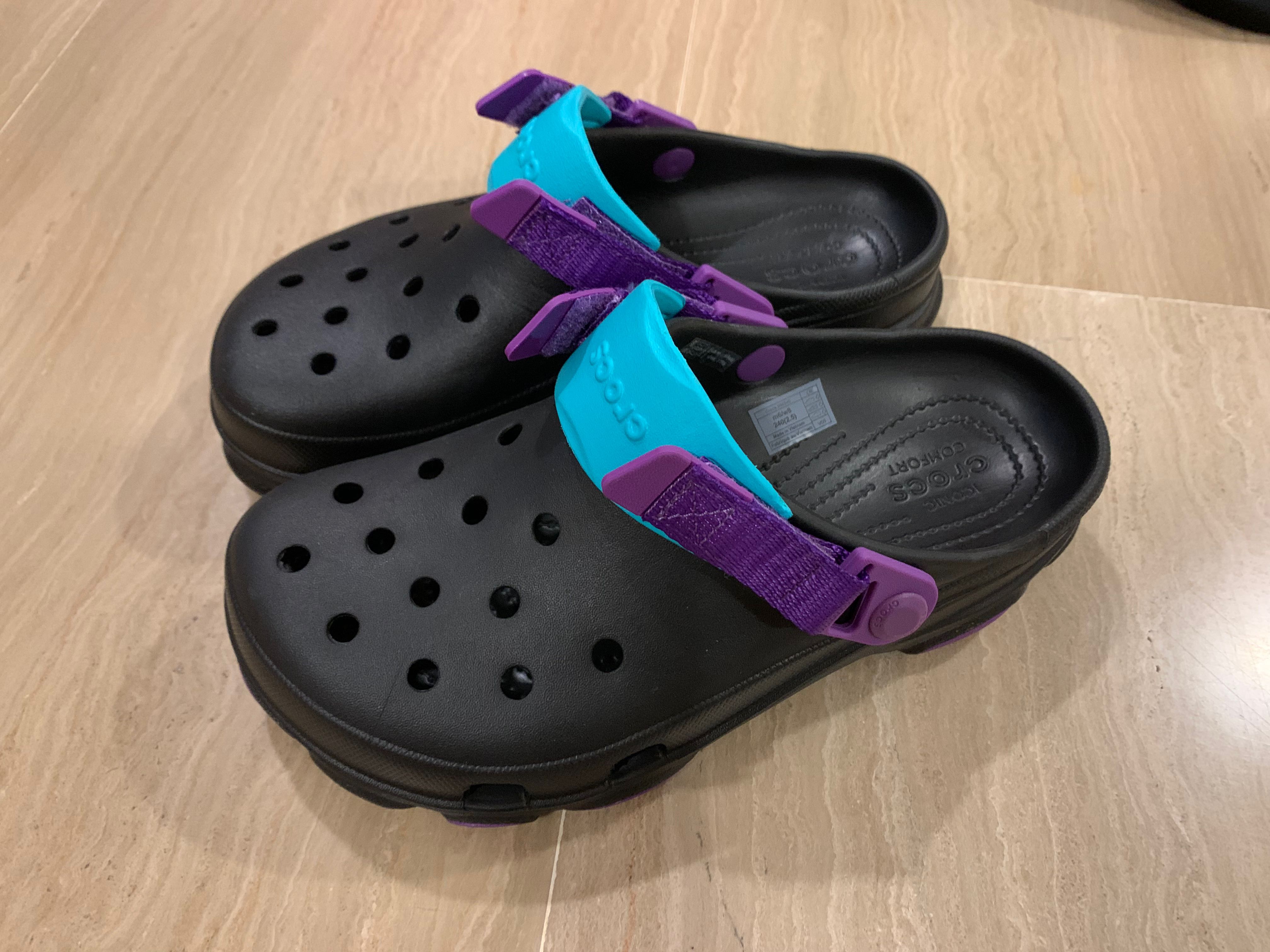 Purple and black crocs sales