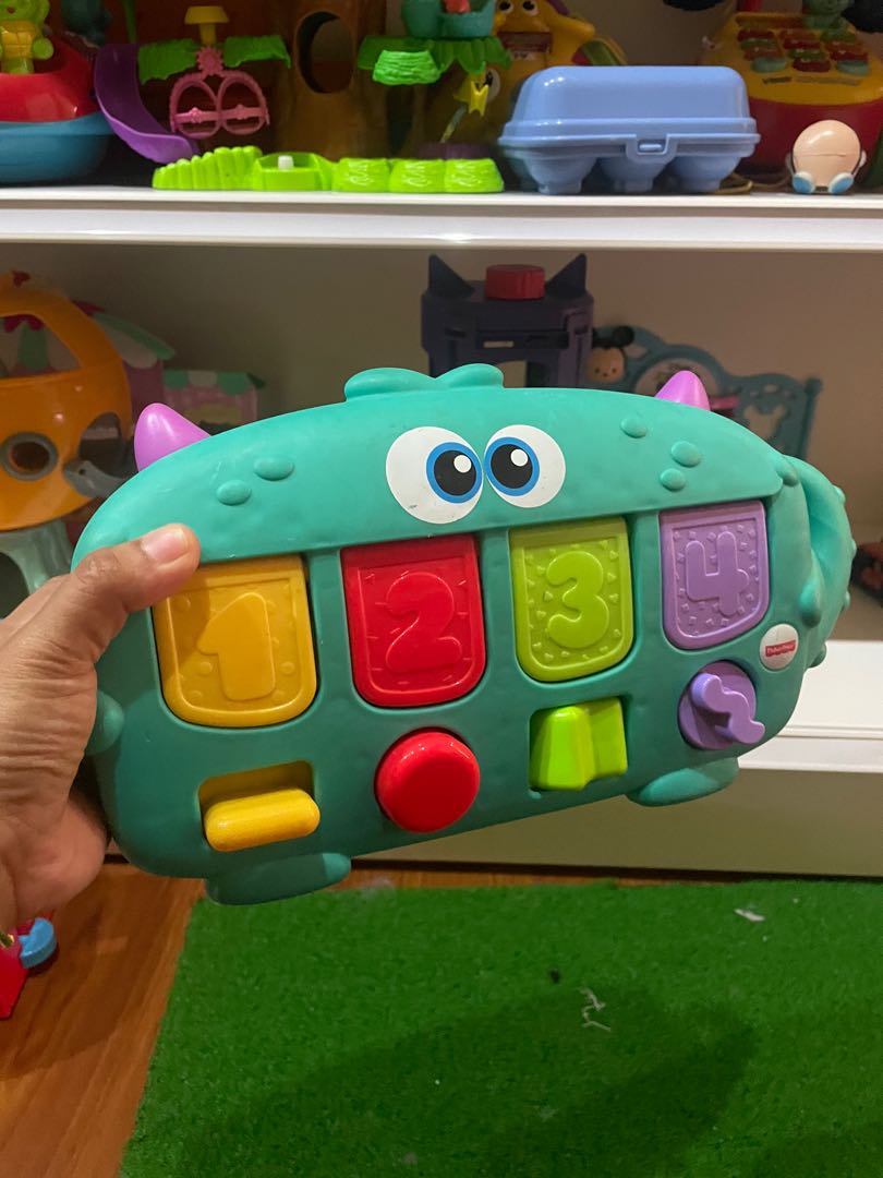 Fisher price monster sale pop up toy