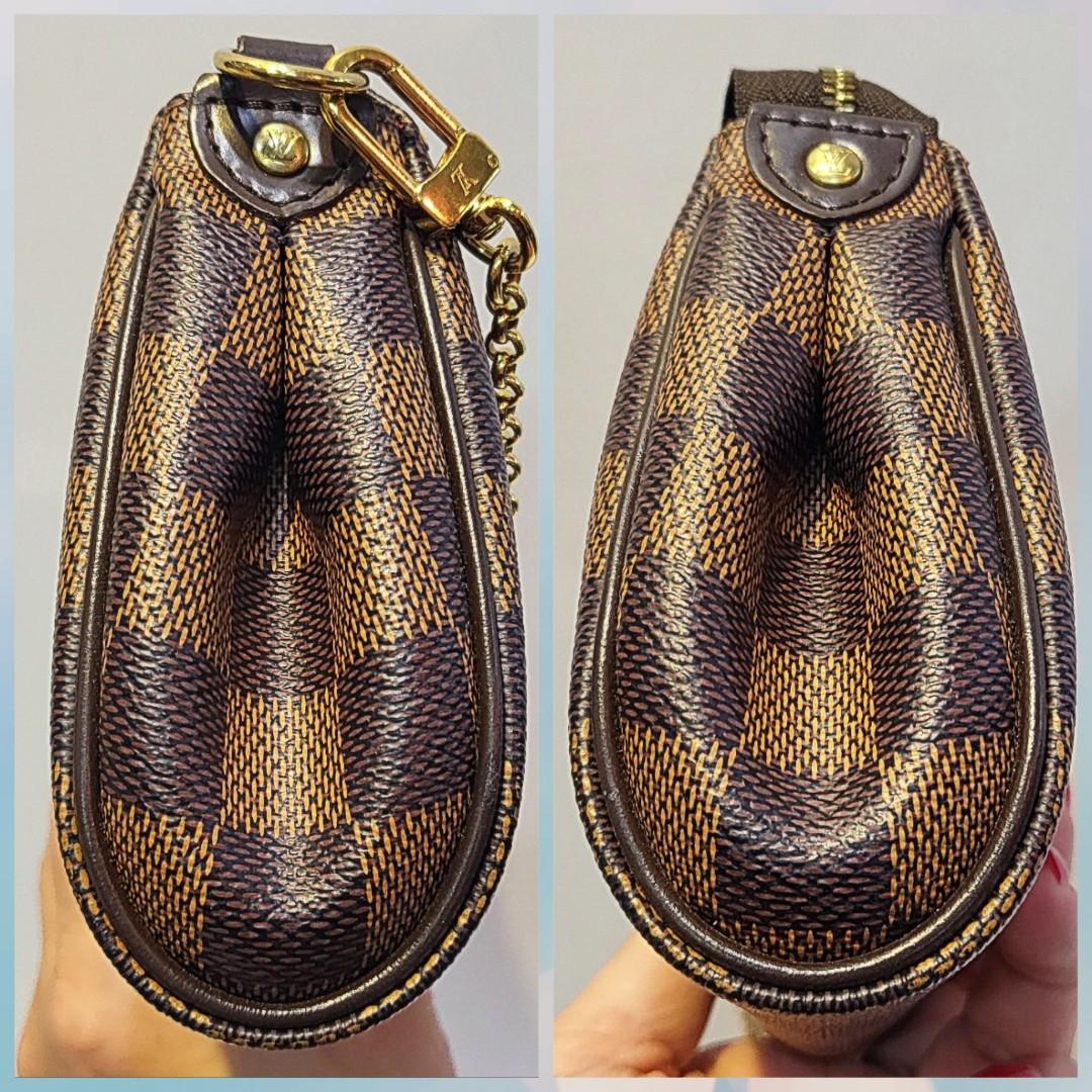 💎💯Authentic LOUIS VUITTON EVA DAMIER EBENE CLUTCH💎, Luxury, Bags &  Wallets on Carousell